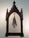 Bats in the bellfry, presented in Victorian gothic frames