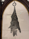 Bats in the bellfry, presented in Victorian gothic frames