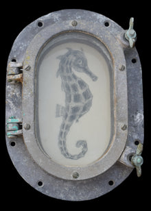  Seahorse in an aluminium porthole, mid-20th century